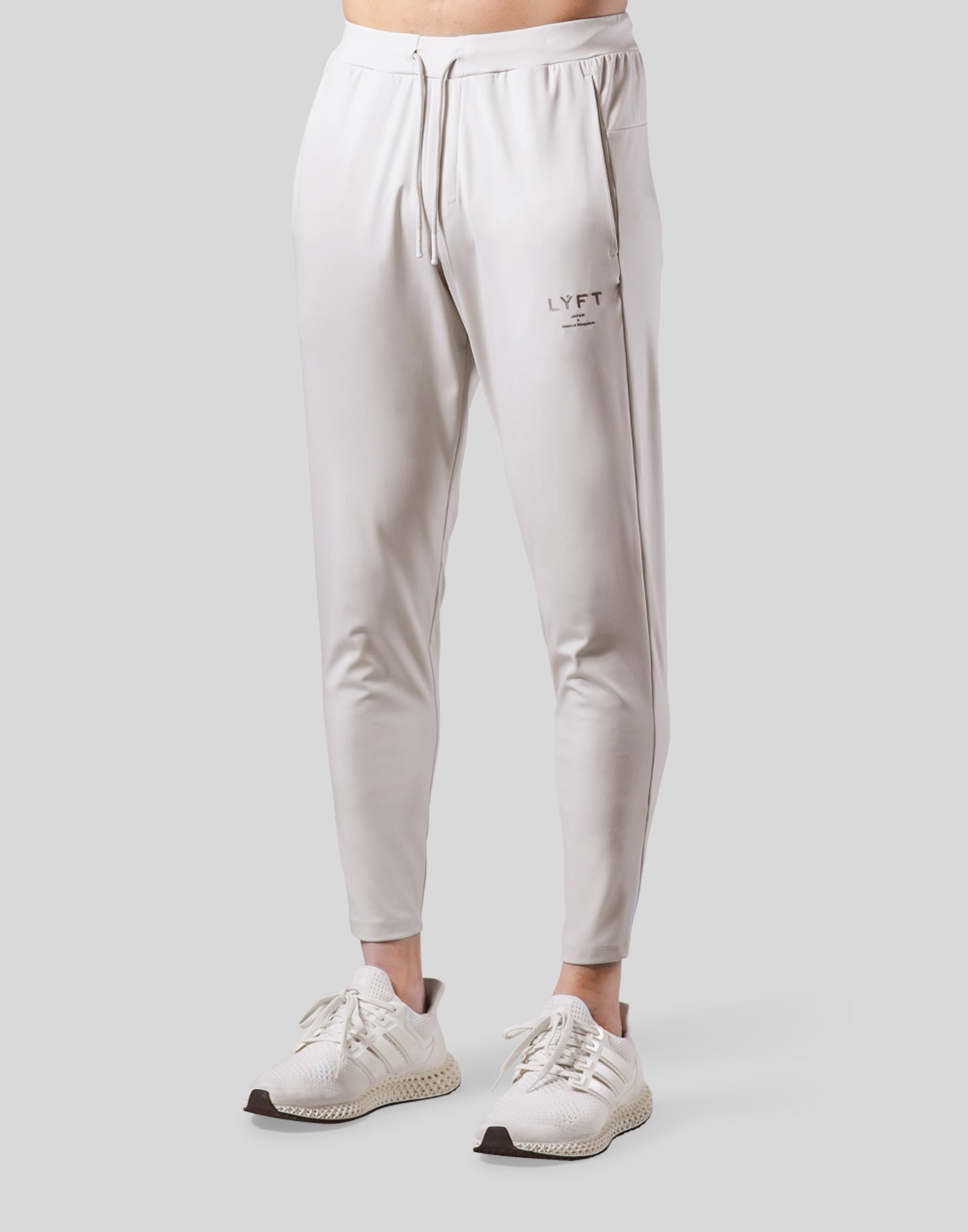 Lyft STRETCH TAPERED PANTS - IVORY Mサイズ 2Way Stretch Tapered Pants - Ivory – LÝFT