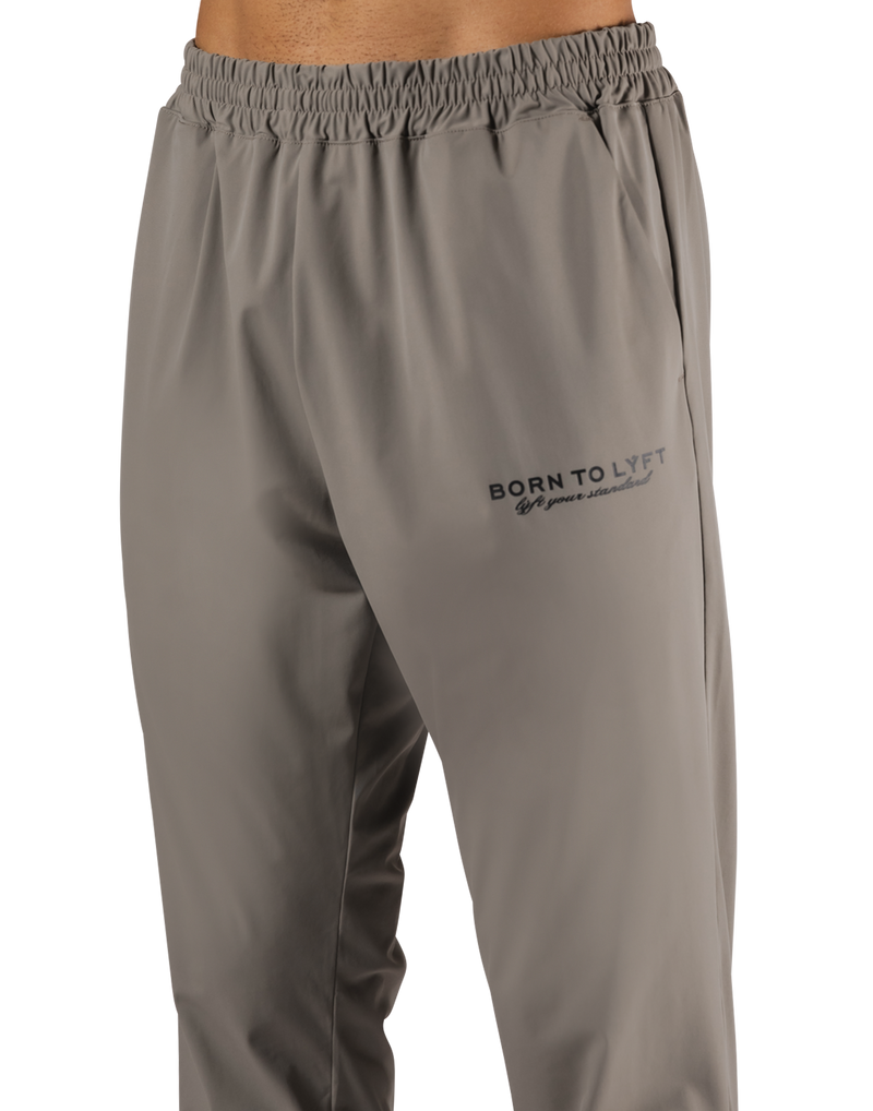 Calf Logo Stretch Slim Straight Pants - Beige – LÝFT Calf Logo Stretch Slim Straight Pants - Beige – LÝFT
