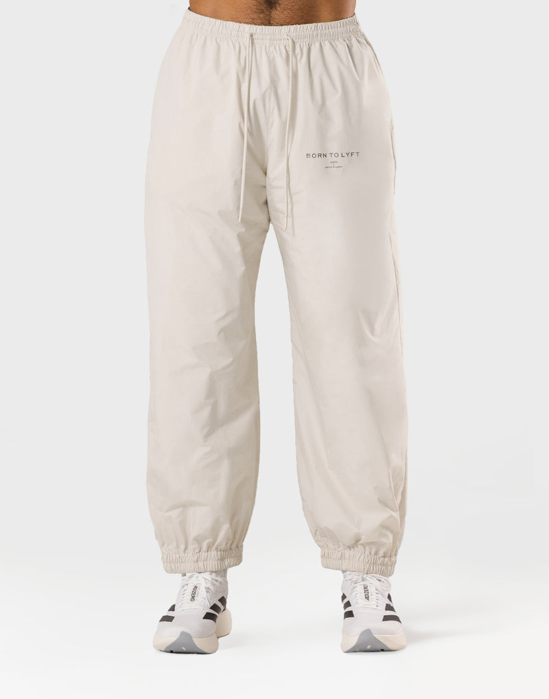BORN TO LYFT ナイロンパンツ Nylon Lounge Joggers - Ivory – LÝFT