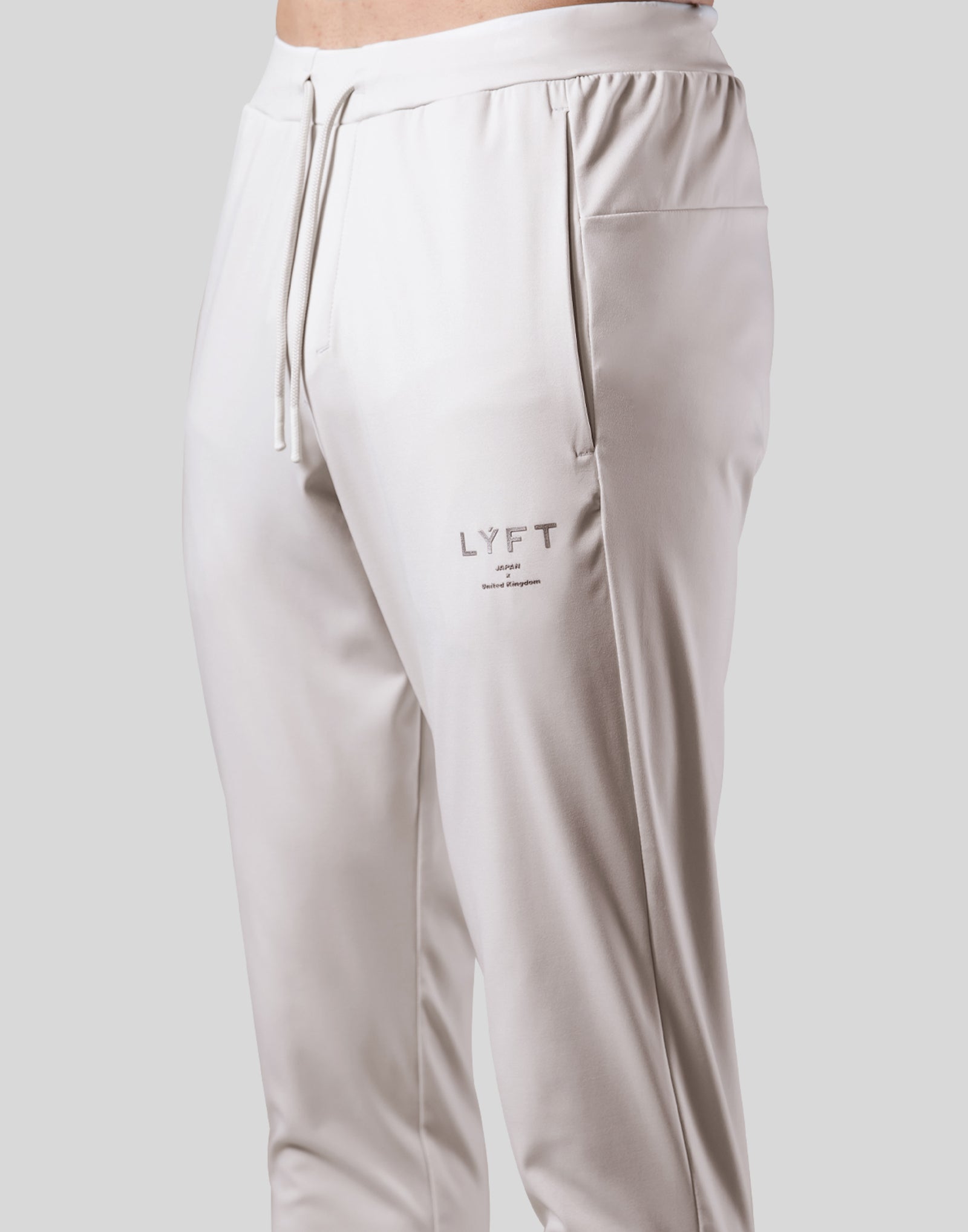 Lyft STRETCH TAPERED PANTS - IVORY Mサイズ 2Way Stretch Tapered Pants - Ivory – LÝFT