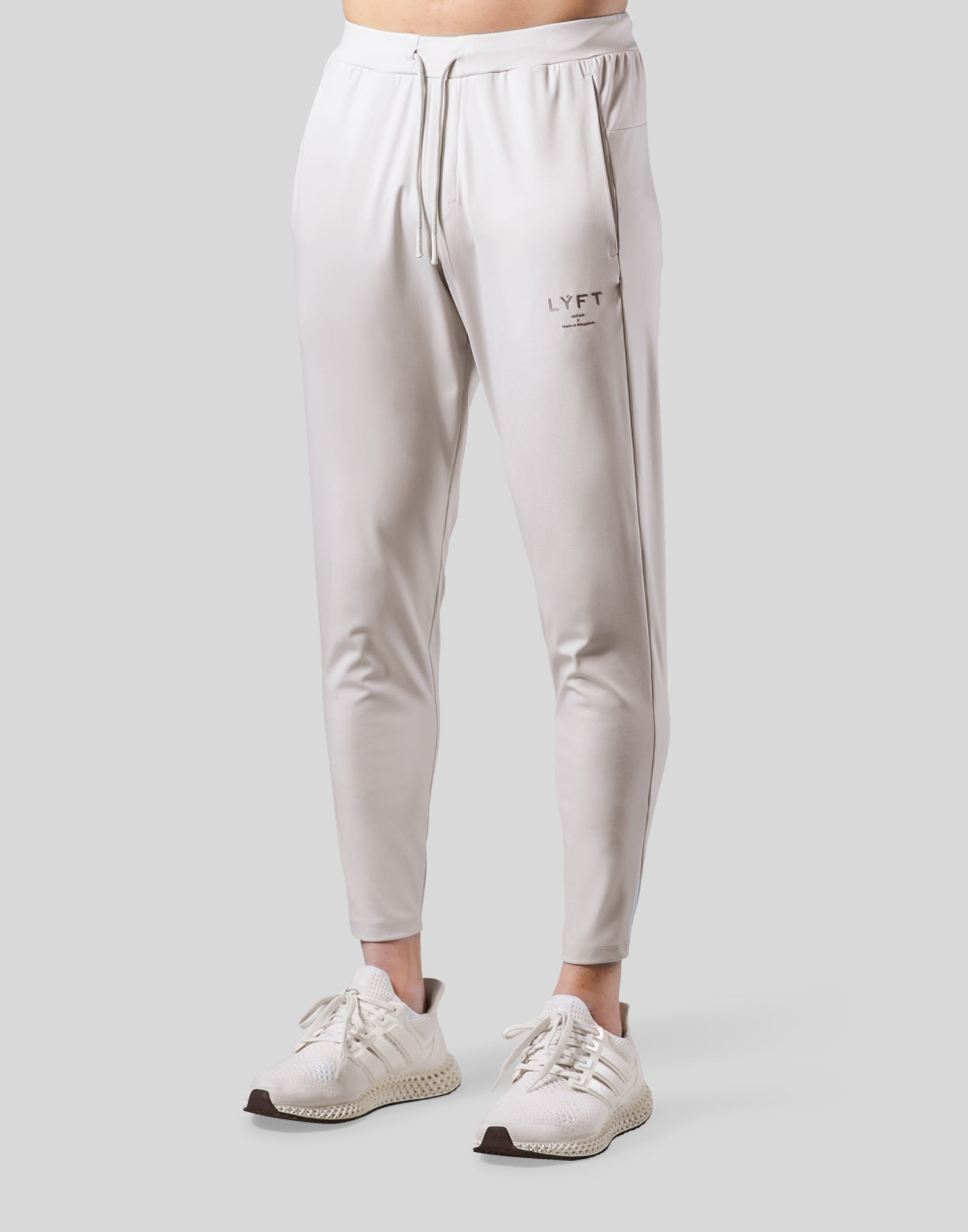 Lyft STRETCH TAPERED PANTS - IVORY Mサイズ 2Way Stretch Tapered Pants - Ivory – LÝFT